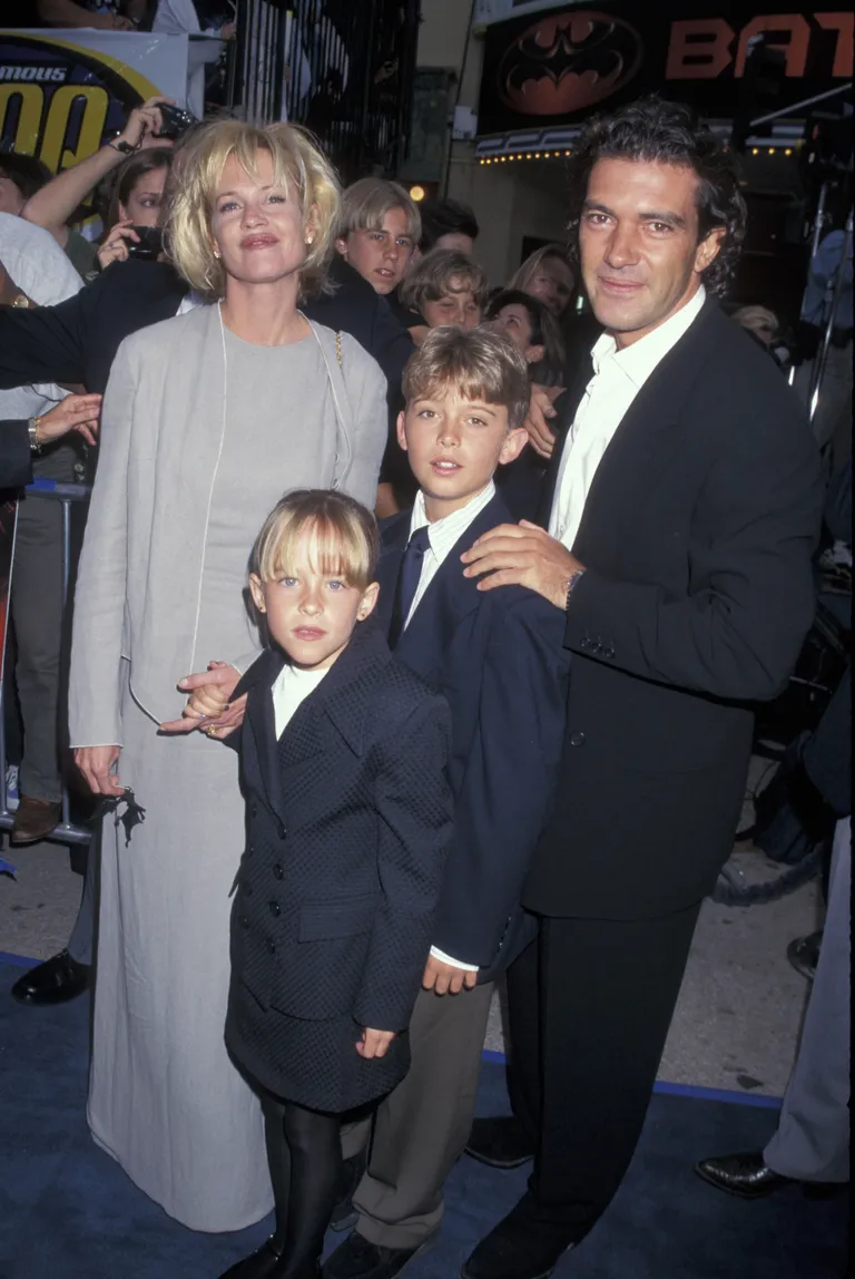 Melanie Griffith, Dakota Johnson, Alexander Bauer, and Antonio Banderas at the Los Angeles premiere of "Batman & Robin," 1997 | Source: Getty Images