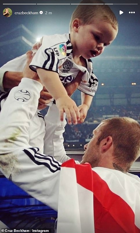 A further photo saw a baby Cruz being lifted up by his father after a Real Madrid match with both father and son wearing the Spanish side's classic white shirt